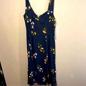 BRAND NEW! Never worn Floral Midi Reformation dress. Size 10.